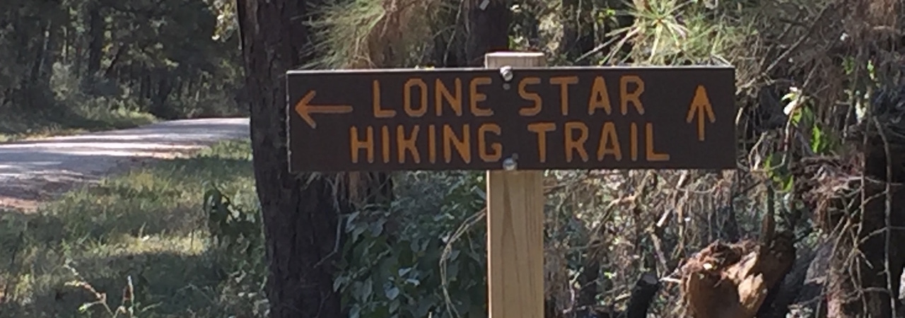 Trailhead sign reading: Lone Star Hiking Trail