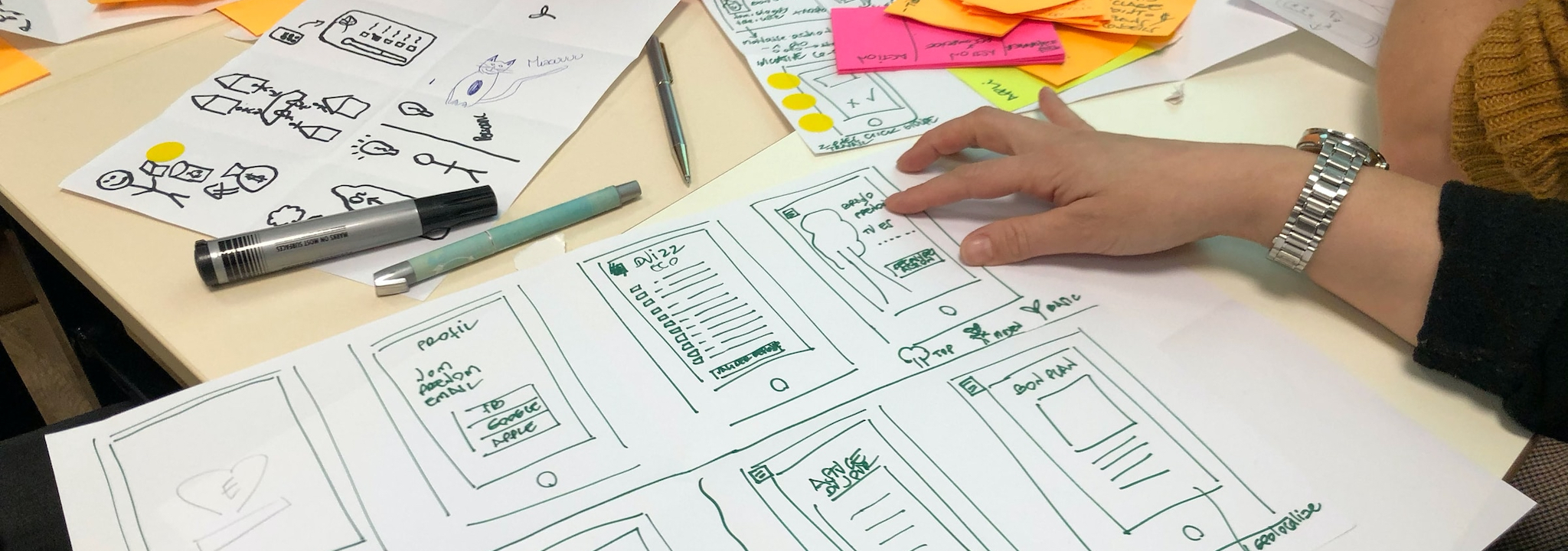 close up of sketches of website wireframes